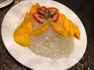 Mango sticky rice - so flavorful and perfectly ripe and sweet strawberries and mango at Sawasdee Thai Cuisine in Mandeville
