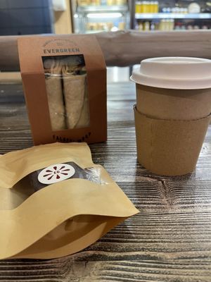 Vegan falafel wrap, almond & dades protein bar and tea  at DOH - Evergreen Organics in Doha