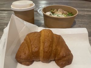 Vegan croissant, coffee with oat milk and Buddha bowl  at DOH - Evergreen Organics in Doha