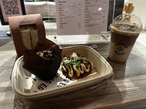 Mini pizzas, burrito wrap and blueberry muffin   at DOH - Evergreen Organics in Doha