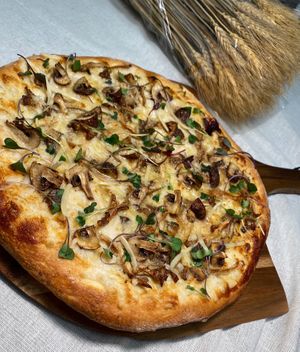 Truffle n' Mushroom Pizza -  at Down 2 Earth Plant Based Cuisine in Las Vegas