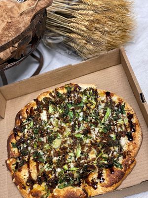 White Italian Pizza w/ house made vegan sausage at Down 2 Earth Plant Based Cuisine in Las Vegas