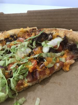 Cheeseburger pizza   at Down 2 Earth Plant Based Cuisine in Las Vegas