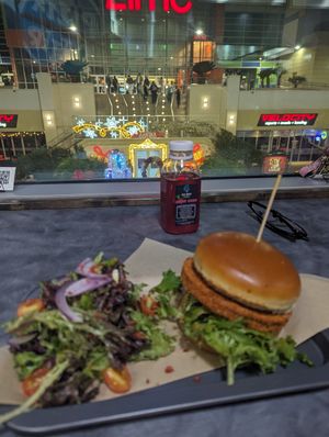 Cajun chicken sandwich and salad at Down 2 Earth Plant Based Cuisine in Las Vegas