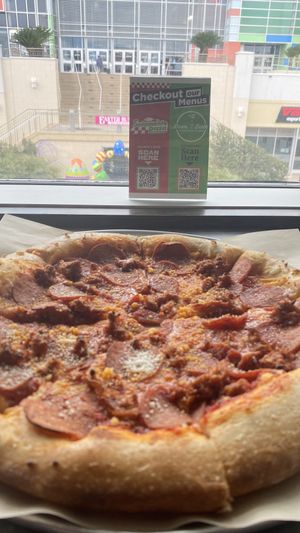 Sausage & Pepperoni pizzaa  at Down 2 Earth Plant Based Cuisine in Las Vegas