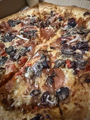 Pizza close up  at Down 2 Earth Plant Based Cuisine in Las Vegas
