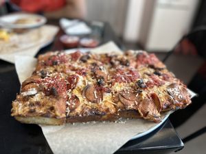 Deep dish pepperoni sausage pizza   at Down 2 Earth Plant Based Cuisine in Las Vegas