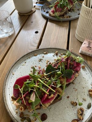 sourdough bread with cauliflower spread and fermented veggies + microgreens and salty granola at Etapa in Prague