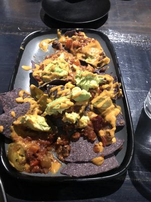 Nachos with added avocado   at Col's Kitchen in Concord