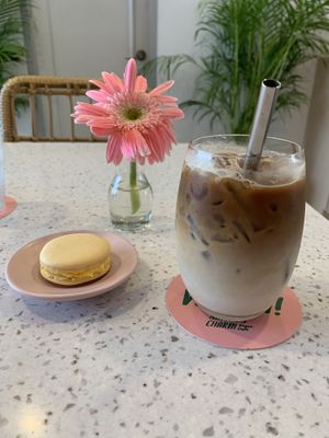 Iced latte and passion fruit macaron  at Nature's Charm in Bangkok