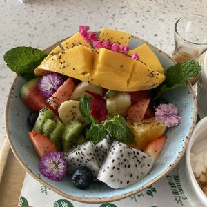 Fruit bowl. Comes with coconut yoghurt and granola. Amazing  at Nature's Charm in Bangkok