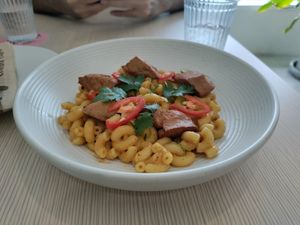Tom yum mac with chikin. So good! at Nature's Charm in Bangkok
