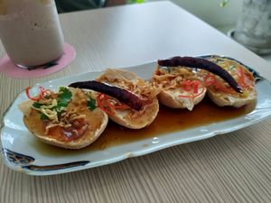 Vegan eggs with a sweet sauce. Must try! at Nature's Charm in Bangkok