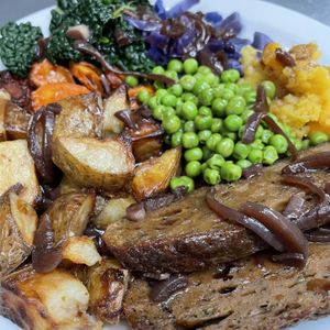 Amazing roast! Glazed seitan and all the veggies! at Earth Arts & Culture Cafe in Brighton