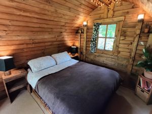 Juniper King Size Bed at The Greenhouse Spa Retreat in Saltash