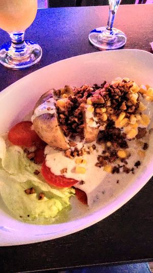 Baked potstoe with v-cheese & v-bacon at Couch Potato in Vienna