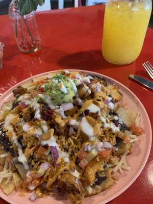 Discada Potatoes Nachos (+ glass of mango water) at Belenty's Love in Fort Worth