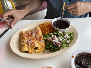 Enchilada “roulette” lol my dad told them to surprise him! He loved them all! Their cashew queso was also delicious.  at Belenty's Love in Fort Worth