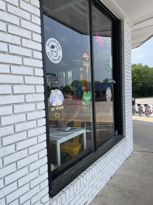 Cute vegan activism stickers all over the store!  at Belenty's Love in Fort Worth