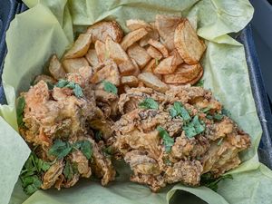 Fried “chicken” was just two large deep fried mushrooms. Very hard and crunchy. Once again, I didn’t get any sauce    at Belenty's Love in Fort Worth
