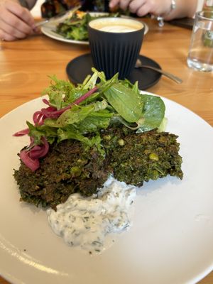Kale pea fritters and soy coffee 👌🏻  at Cafe Stepping Stone in Canberra