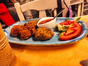 Zucchini balls and tomato balls with sweet tomato sauce at Gia Mas Taverna in Poros