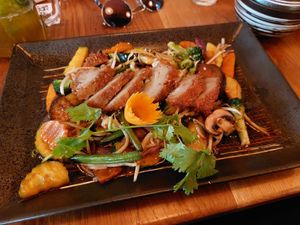 Fried vegetables in dark sauce with faux duck at Com Chay in Mannheim