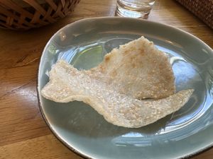 No. 24 My Quang - Trad. zentralvietnamesische Reisnandnudelsuppe kommt mit einem Sesam-Reis-Chip   at Com Chay in Mannheim