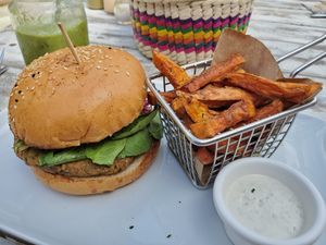 Lentil burger with sweet potatoes at Lido Beach Club  in Playa Del Carmen