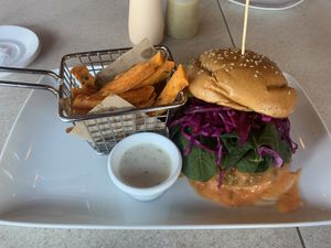 Lentil and chickpea hamburger with fried sweet potatoes  at Lido Beach Club  in Playa Del Carmen