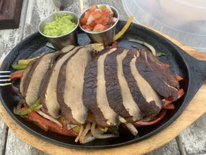 Portobello fajitas. Fantastic!!!! They did bring me beans with cheese on top at first but quickly fixed it when I pointed it out. The flavors here were delicious   at Lido Beach Club  in Playa Del Carmen