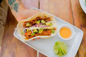 This is a jackfruit pastor with pineapple taco and is so delicious at Lido Beach Club  in Playa Del Carmen