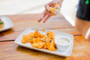 Please try the "buffalo or BBQ cauliflower wings" this are bite-sized cauliflower in a Buffalo or BBQ sauce served with vegan ranch dip at Lido Beach Club  in Playa Del Carmen