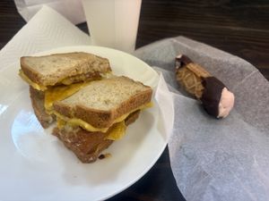 Sausage egg and cheese plus raspberry cannoli    at Jennifer Lee's Gourmet Bakery in Worcester