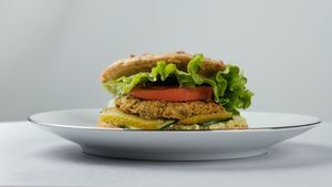 Veggie burger
(sunflower seeds and parsley spread, cucumber, tomatoes, seasonal vegetables patty, pickles, salad, eggplant) at Surya Soul Temple Cafe in Pula