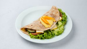 Chandra chapati
(mango chatney spread, salad, tomatoes, cucumber, feta cheese or smoked tofu, garam masala ) at Surya Soul Temple Cafe in Pula