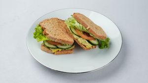 Hummus sandwich 
(salad, hummus, celer, cucumber, onion, mayonnaise, mustard, tomatoes) at Surya Soul Temple Cafe in Pula