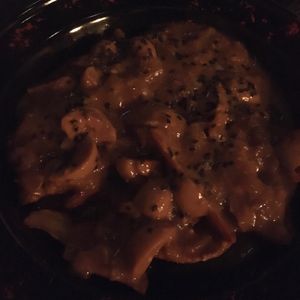 Papas rústicas con salsa de champiñones  at Casa Bruja in Montevideo