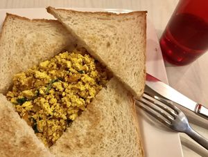 Scrambled tofu on toast. $9.  at Cafe Salivation in Central Singapore