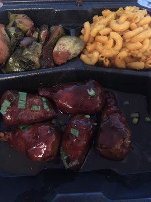 Wangs with Mac n cheez and Brussels sprouts at Houston Sauce Pit in Houston