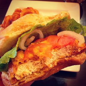 Look how tender and juicy this hand battered patty is! at The Bayside Cafe in Everett