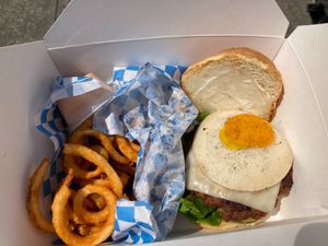 Yo Egg burger with curly fries at The Bayside Cafe in Everett