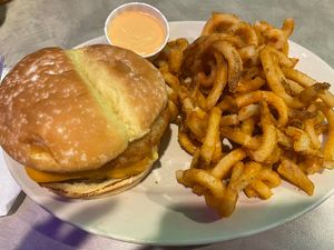 Breakfast sandwich and curly fries with aioli on the sidee  at The Bayside Cafe in Everett