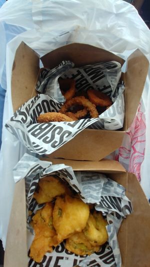 Fried pickles with great, almost corn dog style batter and onion rings at The Bayside Cafe in Everett