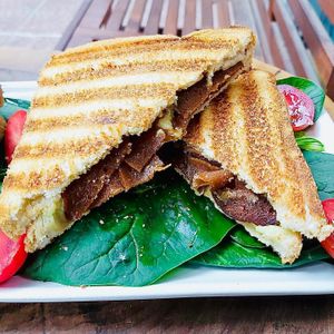 Vegan grilled cheese with vegan meat options at Veganzza in Istanbul