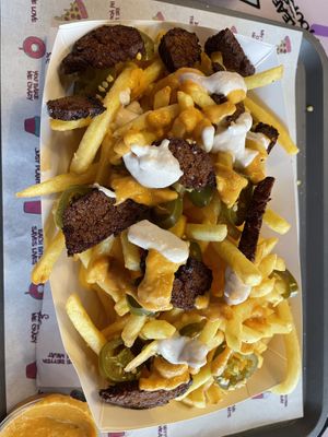 Loaded French fries  at Nosh Cravings in Doha