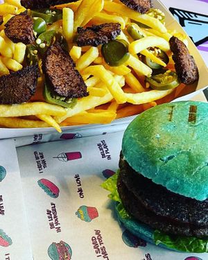 Loaded fries and nosh gauc burger   at Nosh Cravings in Doha