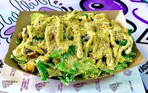 Caesar salad  at Nosh Cravings in Doha