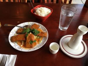 Lemon basil fish with a side of rice and hot sake at Garden Fresh in Palo Alto
