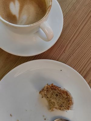 Lemon cake and coffee with oat milk at Smørtorget in Tromsoe